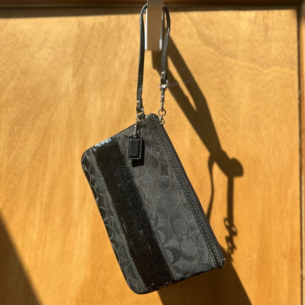 Coach black Wristlet with logo and sequins design